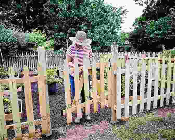 A Beautiful Wooden Gate And Picket Fence Adorning A Garden How To Build Wooden Gates Picket Fences