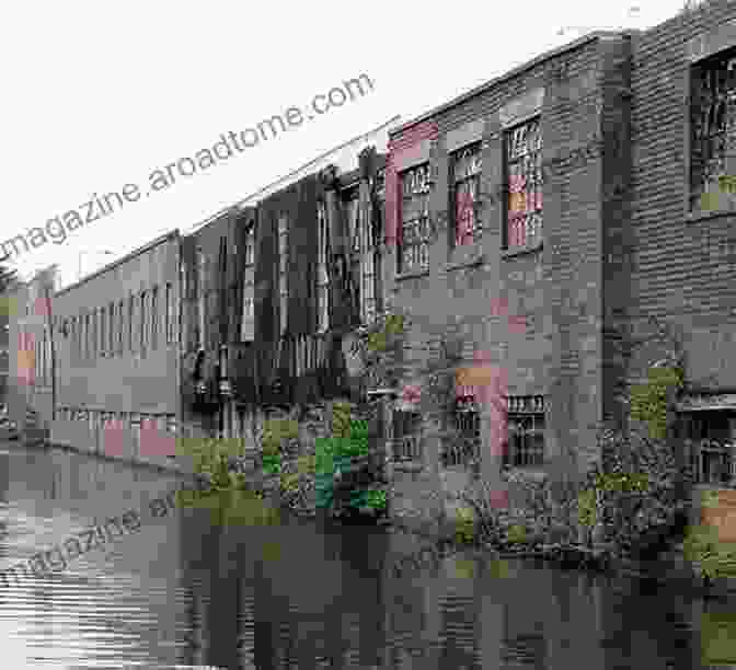 A Historic Photograph Of A Canal Lined With Factories And Warehouses West Midland Canals Through Time: Severn Avon Birmingham