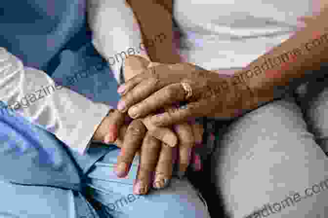 The Hands Of A Person With Dementia Holding Onto A Loved One's Hand The Long Good Bye: Losing LIfe To Dementia